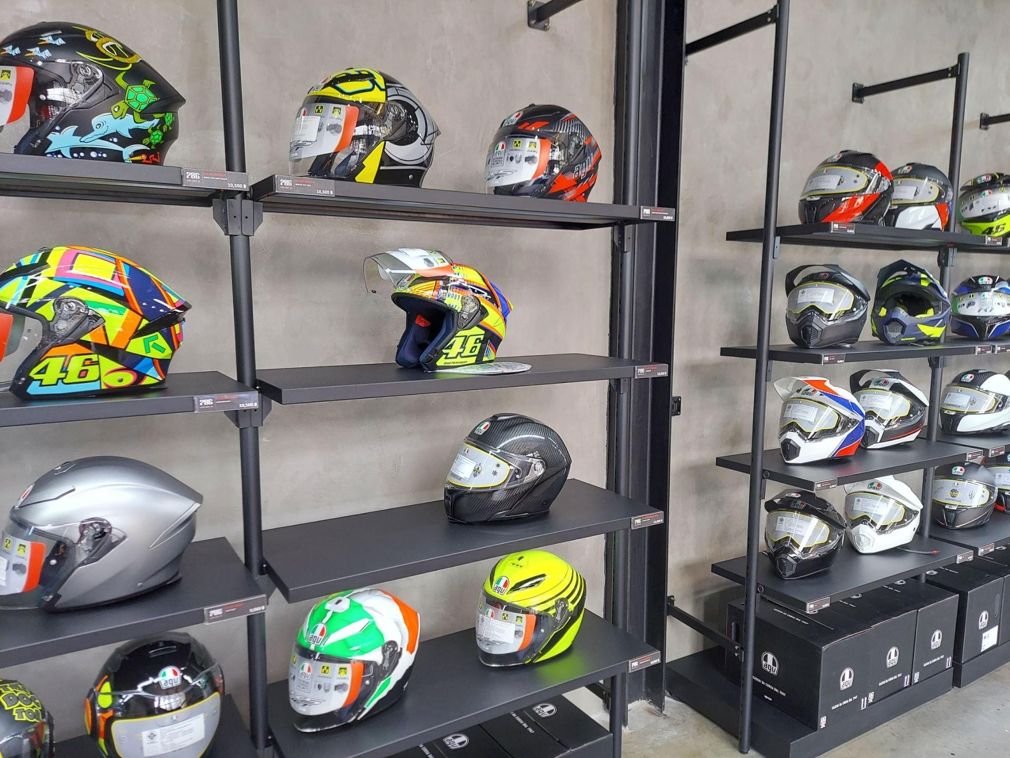 Showcasing AGV open face (left), modular (middle), and full face (right) helmets. Modular helmets, a subset of full-face designs, provide the convenience of an open face with a rounded flip-up chin guard that remains attached.