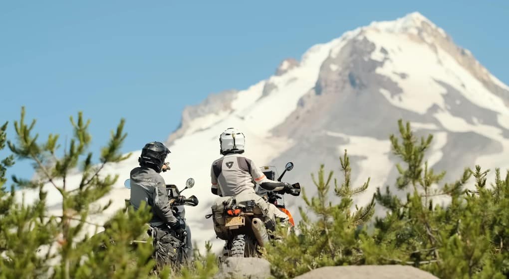 Taking in the views of the snowcapped Mount Jefferson volcanic peak along the Oregon Backcountry Discovery Route. Realistically, you are going to be spending more hours on the saddle than off it during your motorcycle exploration, and so, a comfy seat is a must for ADV riding.