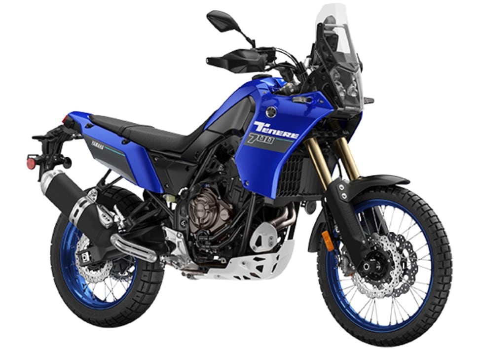 The Yamaha Tenere 700 from 2024 is shown in all of its blue magnificence. It is more compact and agile than its rivals, the KTM 790/890. This bike's ruggedness and enduro spirit can only be contrasted with the equally formidable Aprilia Tuareg 660 or Ducati’s DesertX, which are also enduro-mannered.