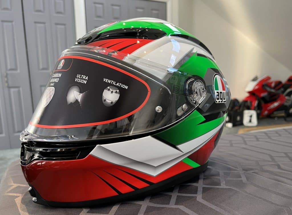 AGV K6 S Excite Camo/Italy motorcycle helmet in eye-catching red/white/green color scheme - offering high visibility and a statistically advantageous profile.