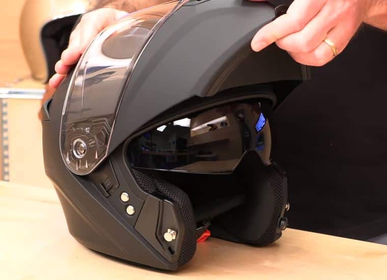 The Sena Impulse helmet flipped up, stopping the chin bar at around 12 o'clock. Although it's not certified for riding like this, you can still use it at stoplights to get some fresh air or when you need to check your phone at a gas stop.